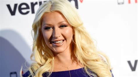 Christina Aguilera poses topless for 41st birthday photos